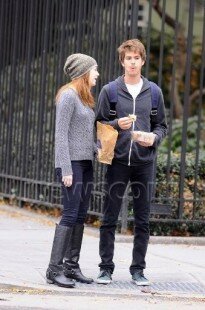 Actress Emma Stone, star of "The Help," goes for a walk with her "The Amazing Spider-Man" co-star Andrew Garfield in New York City