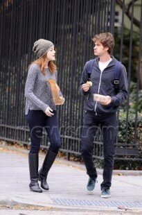 Actress Emma Stone, star of "The Help," goes for a walk with her "The Amazing Spider-Man" co-star Andrew Garfield in New York City