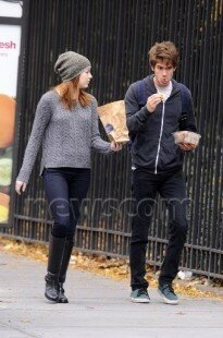 Actress Emma Stone, star of "The Help," goes for a walk with her "The Amazing Spider-Man" co-star Andrew Garfield in New York City